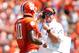 CLEMSON, SC - SEPTEMBER 7: Offensive Coordinator Chad Morris and Tajh Boyd #10 of the Clemson Tigers during a timeout during the game against the South Carolina State Bulldogs at Memorial Stadium on September 7, 2013 in Clemson, South Carolina. (Photo by