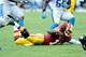 LANDOVER, MD - SEPTEMBER 22: Robert Griffin III #10 of the Washington Redskins fumbles the ball in the fourth quarter against the Detroit Lions at FedExField on September 22, 2013 in Landover, Maryland. (Photo by Greg Fiume/Getty Images)