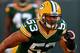 GREEN BAY, WI - AUGUST 09: Nick Perry #53 of the Green Bay Packers participates in warm-ups before a game against the Arizona Cardinals at Lambeau Field on August 9, 2013 in Green Bay, Wisconsin. The Cardinals defeated the Packers 17-0. (Photo by Jonath