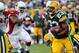 Aug 9, 2013; Green Bay, WI, USA; Green Bay Packers running back Johnathan Franklin (23) runs for short yards during game against the Arizona Cardinals at Lambeau Field. Mandatory Credit: Benny Sieu-USA TODAY Sports