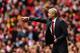 LONDON, ENGLAND - SEPTEMBER 22: Arsene Wenger manager of Arsenal gives instructions during the Barclays Premier League match between Arsenal and Stoke City at Emirates Stadium on September 22, 2013 in London, England. (Photo by Ian Walton/Getty Images)