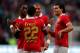 EINDHOVEN, NETHERLANDS - AUGUST 17: (Top L-R) Joshua Brenet, Jeffrey Bruma and Karim Rekik walk over to congratulate Memphis Depay (#22) of PSV after he scores the third goal of the game during the Eredivisie match between PSV Eindhoven and Go Ahead Eag