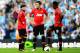 MANCHESTER, ENGLAND - SEPTEMBER 22: (R-L)Wayne Rooney, Michael Carrick and Danny Welbeck of Manchester United look dejected during the Barclays Premier League match between Manchester City and Manchester United at the Etihad Stadium on September 22, 2013