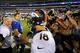 Sep 15, 2013; East Rutherford, NJ, USA; New York Giants quarterback Eli Manning (10) shakes hands with brother Denver Broncos quarterback Peyton Manning (18) after the game at MetLife Stadium. Mandatory Credit: Robert Deutsch-USA TODAY Sports