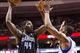 Feb 26, 2013; Philadelphia, PA, USA; Orlando Magic forward Andrew Nicholson (44) shoots over the defense of Philadelphia 76ers forward Thaddeus Young (21) during the second quarter at the Wells Fargo Center. Mandatory Credit: Howard Smith-USA TODAY Sports