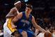 LOS ANGELES, CA - DECEMBER 02: Nikola Vucevic #9 of the Orlando Magic backs in on Dwight Howard #12 of the Los Angeles Lakers during a 113-103 Magic win at Staples Center on December 2, 2012 in Los Angeles, California. NOTE TO USER: User expressly ackno