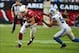 Dec. 16, 2012; Glendale, AZ, USA: Detroit Lions linebacker DeAndre Levy (54) tackles Arizona Cardinals tight end Rob Housler (84) at University of Phoenix Stadium. The Cardinals defeated the Lions 38-10. Mandatory Credit: Mark J. Rebilas-USA TODAY Sports