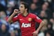 LONDON, ENGLAND - FEBRUARY 23: Rafael of Manchester United celebrates scoring the first goal during the Barclays Premier League match between Queens Park Rangers and Manchester United at Loftus Road on February 23, 2013 in London, England. (Photo by Ian