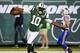 Sep 22, 2013; East Rutherford, NJ, USA; New York Jets wide receiver Santonio Holmes (10) scores a touchdown in the fourth quarter against the Buffalo Bills at MetLife Stadium. Mandatory Credit: Robert Deutsch-USA TODAY Sports