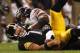 PITTSBURGH, PA - SEPTEMBER 22: Ben Roethlisberger #7 of the Pittsburgh Steelers regains possession after fumbling in the second half against the Chicago Bears during the game on September 22, 2013 at Heinz Field in Pittsburgh, Pennsylvania. (Photo by Ju
