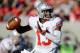 BERKELEY, CA - SEPTEMBER 14: Kenny Guiton #13 of the Ohio State Buckeyes rolls out to pass during the second quarter against the California Golden Bears at California Memorial Stadium on September 14, 2013 in Berkeley, California. (Photo by Thearon W. H