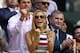 LONDON, ENGLAND - JULY 07: Jelena Ristic, the girlfriend of Novak Djokovic of Serbia cheers during his Gentlemen's Singles Final match against Andy Murray of Great Britain on day thirteen of the Wimbledon Lawn Tennis Championships at the All England Lawn