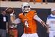 Sep 14, 2013; Stillwater, OK, USA; Oklahoma State Cowboys quarterback J.W. Walsh (4) looks to pass the ball during the first half against the Lamar Cardinals at Boone Pickens Stadium. Mandatory Credit: Richard Rowe-USA TODAY Sports