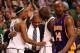 BOSTON - JUNE 17: Paul Pierce #34 and Kevin Garnett #5 of the Boston Celtics hug their head coach Doc Rivers as Kobe Bryant #24 of the Los Angeles Lakers walks by in Game Six of the 2008 NBA Finals on June 17, 2008 at TD Banknorth Garden in Boston, Massa