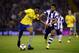 WEST BROMWICH, ENGLAND - SEPTEMBER 25: Chuba Akpom of Arsenal holds off the challenge from Scott Sinclair of West Bromwich Albion during the Capital One Cup third round match between West Bromwich Albion and Arsenal at The Hawthorns on September 25, 2013