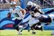 Sep 22, 2013; Nashville, TN, USA; Tennessee Titans quarterback Jake Locker (10) scrambles from the pocket against the San Diego Chargers during the second half at LP Field. The Titans beat the Chargers 20-17. Mandatory Credit: Don McPeak-USA TODAY Sports