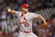 DENVER, CO - SEPTEMBER 18: Adam Wainwright #50 of the St. Louis Cardinals pitches against the Colorado Rockies at Coors Field on September 18, 2013 in Denver, Colorado. (Photo by Dustin Bradford/Getty Images)