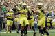 Sep 14, 2013; Eugene, OR, USA; Oregon Ducks quarterback Marcus Mariota (8) picks up wide receiver Josh Huff (1) while celebrating a touchdown in the second quarter against the Tennessee Volunteers at Autzen Stadium. Mandatory Credit: Scott Olmos-USA TODAY