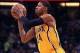 March 8, 2013; Orlando FL, USA; Indiana Pacers small forward Paul George (24) passes the ball against the Orlando Magic during the second half at Amway Center. Indiana Pacers defeated the Orlando Magic 115-86. Mandatory Credit: Kim Klement-USA TODAY Sport