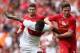 LIVERPOOL, ENGLAND - AUGUST 03: Joe Allen of Liverpool in action with Joel Campbell of Olympiacos in action during the Steven Gerrard Testimonial Match between Liverpool and Olympiacos at Anfield on August 03, 2013 in Liverpool, England. (Photo by Clive