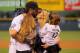 DENVER, CO - SEPTEMBER 25: Todd Helton #17 of the Colorado Rockies kisses his wife Christy as they are joined by their daughers Tierney Faith (L) and Gentry Grace (R) during pregame ceremonies acknowledging his final home at Coors Field and his upcoming
