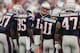FOXBORO, MA - SEPTEMBER 22: Quarterback Tom Brady #12 of the New England Patriots talks to receivers Aaron Dobson #17, Kenbrell Thompkins, Julian Edelman #11 and Michael Hoomanawanui in the huddle during the second half of their 23-3 win over the Tampa B