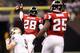 NEW ORLEANS - SEPTEMBER 26: Thomas DeCoud #28 of the Atlanta Falcons celebrates after making an interception against the New Orleans Saints at the Louisiana Superdome on September 26, 2010 in New Orleans, Louisiana. (Photo by Chris Graythen/Getty Images