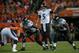 DENVER, CO - SEPTEMBER 5: Quarterback Joe Flacco #5 of the Baltimore Ravens audibles at the line of scrimmage against the Denver Broncos during the game at Sports Authority Field at Mile High on September 5, 2013 in Denver Colorado. (Photo by Dustin Brad