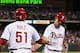 May 17, 2013; Philadelphia, PA, USA; Philadelphia Phillies third baseman Michael Young (10) celebrates scoring with catcher Carlos Ruiz (51) during the eighth inning against the Cincinnati Reds at Citizens Bank Park. The Phillies defeated the Reds 5-3. Ma