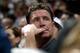MIAMI - JANUARY 30: Former Miami Dolphin quarterback Dan Marino watches the game between the Miami Heat and the Houston Rockets on January 30, 2005 at American Airlines Arena in Miami, Florida. The heat defeated the Rockets 104-95. NOTE TO USER: User ex