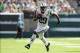 Sep 8, 2013; East Rutherford, NJ, USA; New York Jets running back Bilal Powell (29) rushes with the ball against the Tampa Bay Buccaneers during the fourth quarter of a game at MetLife Stadium. The Jets won 18-17. Mandatory Credit: Brad Penner-USA TODAY S