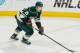 ST. PAUL, MN - APRIL 21: Jonas Brodin #25 of the Minnesota Wild skates with the puck against the Calgary Flames during the game on April 21, 2013 at the Xcel Energy Center in St. Paul, Minnesota. (Photo by Bruce Kluckhohn/NHLI via Getty Images)