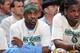 DENVER, CO - APRIL 10: Ty Lawson #3 and Kenneth Faried #35 of the Denver Nuggets, wearing NBA Green Week T-shirts, look on from the bench during a game against the San Antonio Spurs on April 10, 2013 at the Pepsi Center in Denver, Colorado. NOTE TO USER: