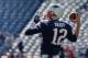 FOXBORO, MA - SEPTEMBER 22: Tom Brady #12 of the New England Patriots throws before a game with the Tampa Bay Buccaneers at Gillette Stadium on September 22, 2013 in Foxboro, Massachusetts. (Photo by Jim Rogash/Getty Images)