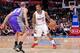 LOS ANGELES, CA - APRIL 3: Eric Bledsoe #12 of the Los Angeles Clippers controls the ball against Kendall Marshall #12 of the Phoenix Suns at Staples Center on April 3, 2013 in Los Angeles, California. NOTE TO USER: User expressly acknowledges and agrees