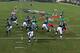 Vick gives away where he's going with the football.