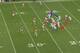 The fullback blocks the back side, while Ford uses his speed to attack the corner.