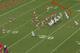 Reece would leave the slot and swing past the blocking to the end zone.