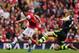 LONDON, ENGLAND - SEPTEMBER 22: Mesut Oezil (L) of Arsenal avoids the challenge of Ryan Shawcross (R) of Stoke City during the Barclays Premier League match between Arsenal and Stoke City at Emirates Stadium on September 22, 2013 in London, England. (Ph