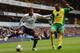 LONDON, ENGLAND - SEPTEMBER 14: Kyle Walker of Spurs is marshalled by Russell Martin of Norwich City during the Barclays Premier League match between Tottenham Hotspur and Norwich City at White Hart Lane on September 14, 2013 in London, England. (Photo