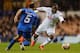 LONDON, ENGLAND - SEPTEMBER 19: Danny Rose of Spurs goes past Morten Moldskred of Trosmo during the UEFA Europa League Group K match between Tottenham Hotspur FC and Tromso IL at White Hart Lane on September 19, 2013 in London, England. (Photo by Clive