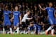 LONDON, ENGLAND - MAY 08: Gylfi Sigurdsson of Spurs celebrates after scoring his team's second goal whilst Chelsea palyers protest during the Barclays Premier League match between Chelsea and Tottenham Hotspur at Stamford Bridge on May 8, 2013 in London,