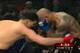 Diaz braces his head against Cyborg and batters him behind the elbows.