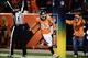 Sep 23, 2013; Denver, CO, USA; Denver Broncos wide receiver Wes Welker (83) reacts to his touchdown reception in the second quarter against the Oakland Raiders at Sports Authority Field at Mile High. Mandatory Credit: Ron Chenoy-USA TODAY Sports