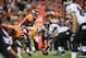 DENVER, CO - SEPTEMBER 5: Guard Gino Gradkowski #66 of the Baltimore Ravens prepares to snap the ball against the Denver Broncos during the game at Sports Authority Field at Mile High on September 5, 2013 in Denver Colorado. (Photo by Dustin Bradford/Gett