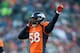 DENVER, CO - DECEMBER 23: Outside linebacker Von Miller #58 of the Denver Broncos tries to get some noise out of the home crowd during a game against the Cleveland Browns at Sports Authority Field at Mile High on December 23, 2012 in Denver, Colorado. Th