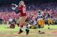 SAN FRANCISCO, CA - SEPTEMBER 08: Tight end Vernon Davis #85 of the San Francisco 49ers catches a pass for a touchdown, as Jarrett Bush #24 of the Green Bay Packers pursues in the third quarter at Candlestick Park on September 8, 2013 in San Francisco, C
