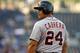 KANSAS CITY, MO - SEPTEMBER 07: Miguel Cabrera #24 of the Detroit Tigers looks back at the Kansas City Royals dugout in the first inning on September 7, 2013 at Kauffman Stadium in Kansas City, Missouri. (Photo by Kyle Rivas/Getty Images)