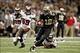 December 16, 2012; New Orleans, LA, USA; New Orleans Saints wide receiver Marques Colston (12) runs after a catch as Tampa Bay Buccaneers middle linebacker Mason Foster (59) and outside linebacker Lavonte David (54) pursue during the first half of a game