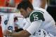 September 16, 2012; Pittsburgh, PA, USA; New York Jets quarterback Tim Tebow (15) sits on the bench against the Pittsburgh Steelers during the third quarter at Heinz Field. The Pittsburgh Steelers won 27-10. Mandatory Credit: Charles LeClaire-USA TODAY Sp